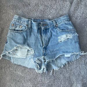 Levi’s ripped shorts.